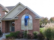 Jaco sealing a brick home